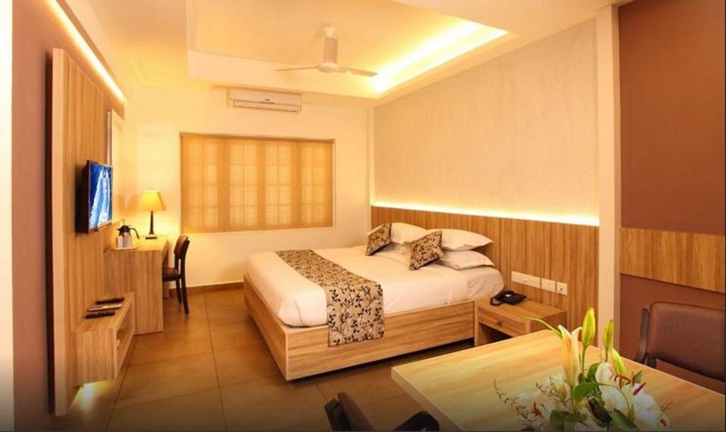 Hotel Luciya Palace Thrissur Habitación foto